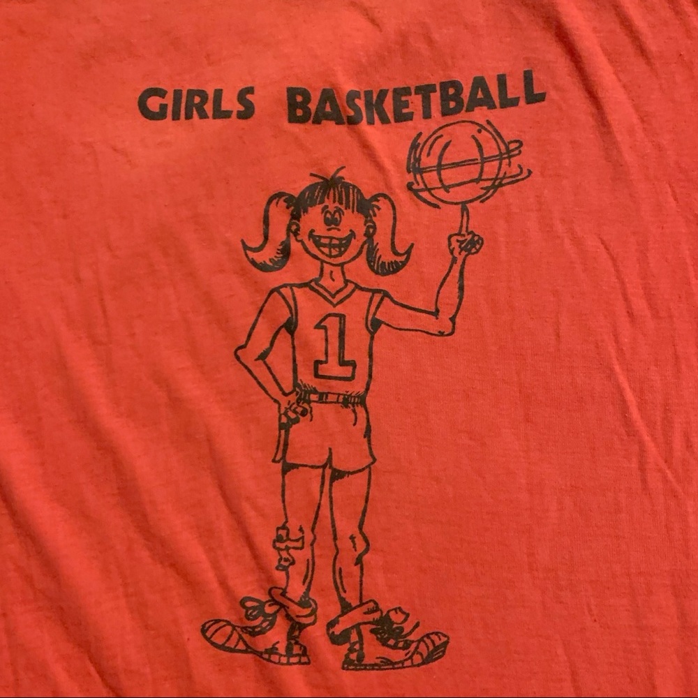 Paper thin vintage girls basketball shirt.